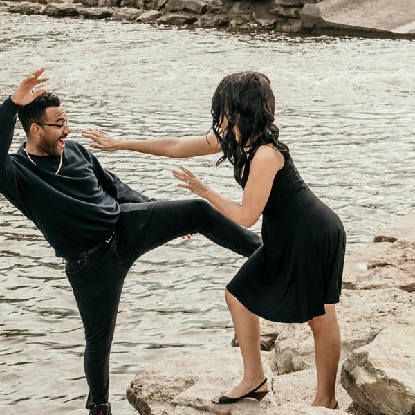 Person feeling energetic and happy outdoors in a natural setting.